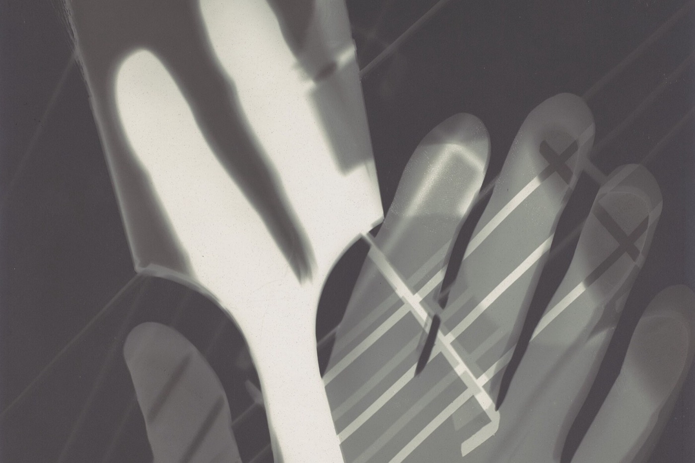 Photogram of overlapping hands